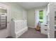 Bright bedroom with white dresser and modern decor. Natural light at 2750 Chamberlin Dr, Indianapolis, IN 46227