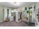 Unique bedroom with loft bed, desk area, and plenty of natural light at 2750 Chamberlin Dr, Indianapolis, IN 46227