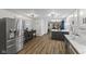 Bright kitchen with stainless steel appliances, modern cabinetry, and an open layout at 2750 Chamberlin Dr, Indianapolis, IN 46227