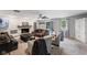 Comfortable living room featuring a stone fireplace, cozy seating, and inviting ambiance at 2750 Chamberlin Dr, Indianapolis, IN 46227