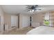 Well-lit main bedroom featuring closet, dresser, and large windows at 2750 Chamberlin Dr, Indianapolis, IN 46227