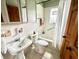 Cozy bathroom featuring white tile, classic fixtures, and a shower-tub combo for a comfortable and functional space at 2922 E 62Nd St, Indianapolis, IN 46220