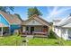 Charming bungalow style house with brick porch columns and a quaint entryway at 3042 Newton Ave, Indianapolis, IN 46201