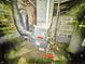 Basement furnace room with moss and signs of water intrusion at 3042 Newton Ave, Indianapolis, IN 46201