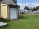 View of the backyard featuring a shed, a grassy lawn and a wooden fence at 3143 Carson Ave, Indianapolis, IN 46227