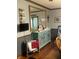 Dining room features hardwood floors, a large mirror, and accent furniture at 3143 Carson Ave, Indianapolis, IN 46227
