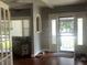 This entryway features hardwood floors, natural light, and an adjacent sitting area at 3143 Carson Ave, Indianapolis, IN 46227