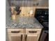 Oak cabinets and laminate countertops with electric range in a kitchen at 3143 Carson Ave, Indianapolis, IN 46227