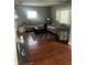 Comfortable living room with hardwood floors, neutral-toned sofas, and stylish accents at 3143 Carson Ave, Indianapolis, IN 46227