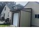 Attached garage and shed provide ample storage and parking space at 3143 Carson Ave, Indianapolis, IN 46227
