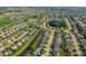 Expansive aerial view showcasing a well-planned community with lush green spaces, winding waterways and serene ponds at 3230 Hemlock St, Whiteland, IN 46184
