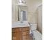 Bathroom with a single sink vanity and a large framed mirror at 3230 Hemlock St, Whiteland, IN 46184