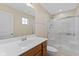 Bathroom with a vanity, large mirror and shower stall with glass doors at 3230 Hemlock St, Whiteland, IN 46184