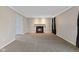 Comfortable living room showcasing a fireplace and neutral color scheme at 3230 Hemlock St, Whiteland, IN 46184