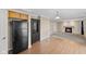 Cozy living space with a fireplace that seamlessly connects to the kitchen at 3230 Hemlock St, Whiteland, IN 46184
