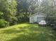 Detached garage and yard offering ample space and possibilities at 3429 Kinnear Ave, Indianapolis, IN 46218