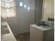 Functional laundry area with sink and three windows at 3429 Kinnear Ave, Indianapolis, IN 46218