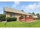 A well-maintained backyard featuring a wooden deck and lush green lawn, perfect for outdoor entertaining at 35 Decourcy Ln, Franklin, IN 46131
