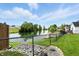 A large backyard overlooks a small river at 35 Decourcy Ln, Franklin, IN 46131