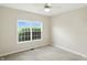 Cozy bedroom with carpet flooring and a large window with ample natural light at 35 Decourcy Ln, Franklin, IN 46131