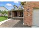 Charming front porch with brick columns and dormer windows, adding architectural interest at 35 Decourcy Ln, Franklin, IN 46131