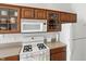 Well-equipped kitchen features a gas range, ample cabinet space, and white appliances at 35 Decourcy Ln, Franklin, IN 46131