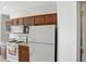 Bright kitchen shows a gas range, white refrigerator, and natural lighting at 35 Decourcy Ln, Franklin, IN 46131