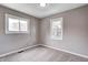 Bedroom with carpet and two windows at 3617 Woodcliff Dr, Indianapolis, IN 46203