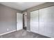 Bedroom featuring carpet, closet and doorway at 3617 Woodcliff Dr, Indianapolis, IN 46203