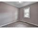 Neutral bedroom featuring a window and neutral carpet at 3617 Woodcliff Dr, Indianapolis, IN 46203