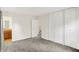 Bedroom with neutral carpet and closet, leading to bathroom at 3663 Kline N Dr, Indianapolis, IN 46226