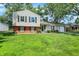 Charming two-story home featuring a well-manicured lawn, classic design, and a cozy, inviting appeal at 3663 Kline N Dr, Indianapolis, IN 46226