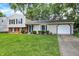 Charming two-story home featuring a well-manicured lawn, classic design, and a cozy, inviting appeal at 3663 Kline N Dr, Indianapolis, IN 46226