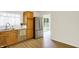 Bright kitchen with wood cabinets and stainless steel refrigerator at 3663 Kline N Dr, Indianapolis, IN 46226