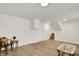Open living area featuring hardwood floors and staircase at 3663 Kline N Dr, Indianapolis, IN 46226