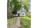 Exterior view of the house with a front yard at 405 N Bradley Ave, Indianapolis, IN 46201