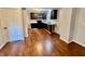 Renovated kitchen boasts modern appliances and sleek dark cabinets offering a stylish cooking space at 405 N Bradley Ave, Indianapolis, IN 46201