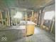 Bathroom under construction with visible framing and a tub at 434 N Bradley Ave, Indianapolis, IN 46201