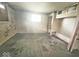 Bedroom with hardwood floors, a window and closet access at 434 N Bradley Ave, Indianapolis, IN 46201