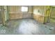 Bedroom with hardwood floors and paneling at 434 N Bradley Ave, Indianapolis, IN 46201