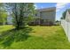 Spacious backyard with a deck, offering ample space for outdoor activities and relaxation at 4533 Golden Meadow Dr, Indianapolis, IN 46254