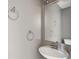 Neutral-toned half bathroom with white sink and chrome fixtures at 4533 Golden Meadow Dr, Indianapolis, IN 46254