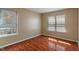 Bedroom with wood floor and two windows at 4533 Golden Meadow Dr, Indianapolis, IN 46254