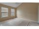 Spacious bedroom featuring vaulted ceiling and two bright windows at 4533 Golden Meadow Dr, Indianapolis, IN 46254
