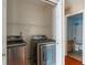 Laundry room equipped with stainless steel washer and dryer at 4533 Golden Meadow Dr, Indianapolis, IN 46254