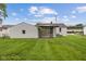 A cozy house boasting a well-maintained backyard with lush green lawn at 4749 W Smith Valley Rd, Greenwood, IN 46142