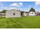 A cozy house boasting a well-maintained backyard with lush green lawn at 4749 W Smith Valley Rd, Greenwood, IN 46142