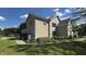 Well-maintained home with lush landscaping, offering an inviting exterior at 4770 Winterberry Pl, Columbus, IN 47201