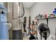 Functional basement area with utility equipment, storage shelves, and ample space at 5120 Woodhurst Ln, Indianapolis, IN 46239
