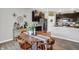 Cozy dining area featuring a wooden table, chairs, and stylish decor at 5120 Woodhurst Ln, Indianapolis, IN 46239